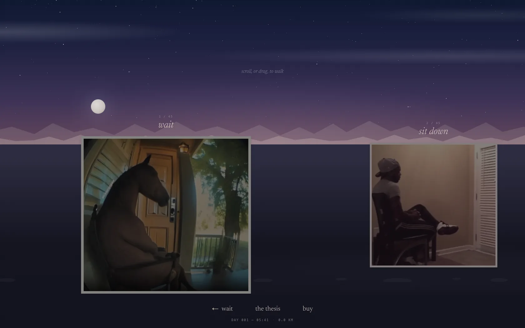 The long wait gallery at night, with framed photographs standing on a dark plain